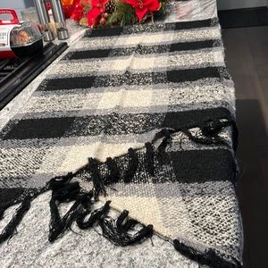 Scarf/wrap Plaid in large blocks of cream gray and black.